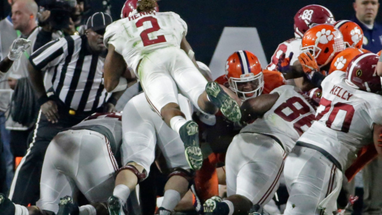 THE LATEST: Clemson, 'Bama tied at 14 at half of title game